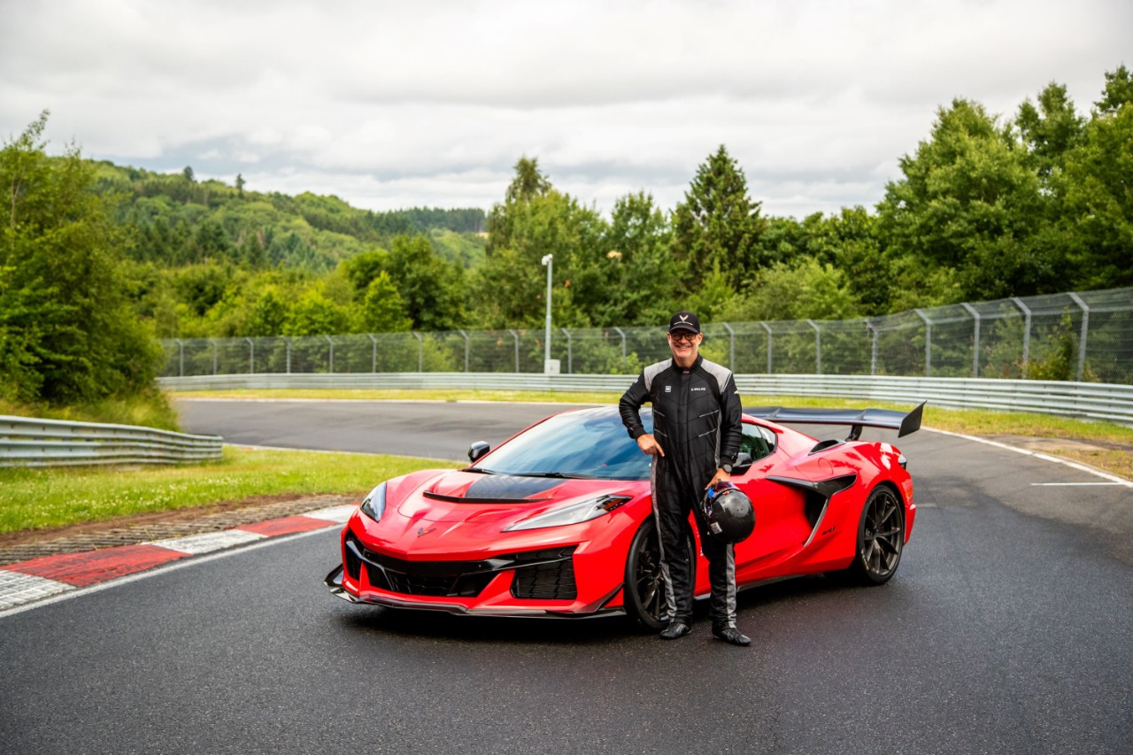 Man with red car at Nurburgring